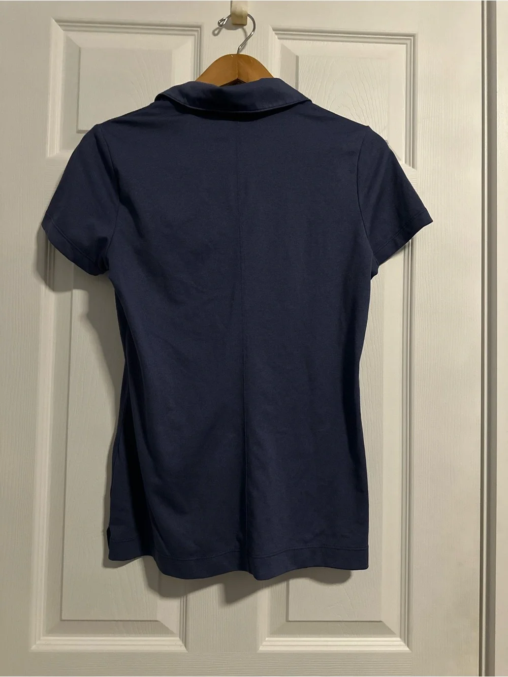 Nike Women's Navy Polo Top with Rhinestone Swoosh